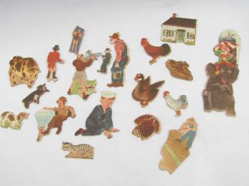 catalog photo of heavy cardboard die-cut animals and people, old puzzle pieces for crafts