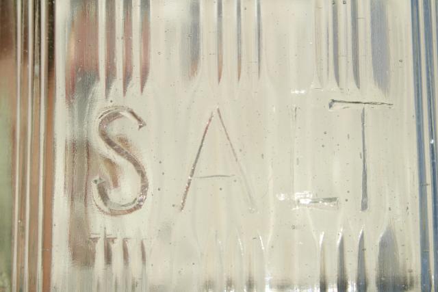 photo of heavy old glass Salt pig, large ribbed glass hoosier jar embossed lettering #6