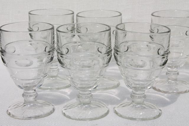 photo of heavy old pressed glass water goblets, vintage wine glasses thumbprint band #1