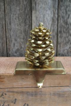 catalog photo of heavy polished brass pinecone, Christmas stocking holder or wreath hanger mantel hook 