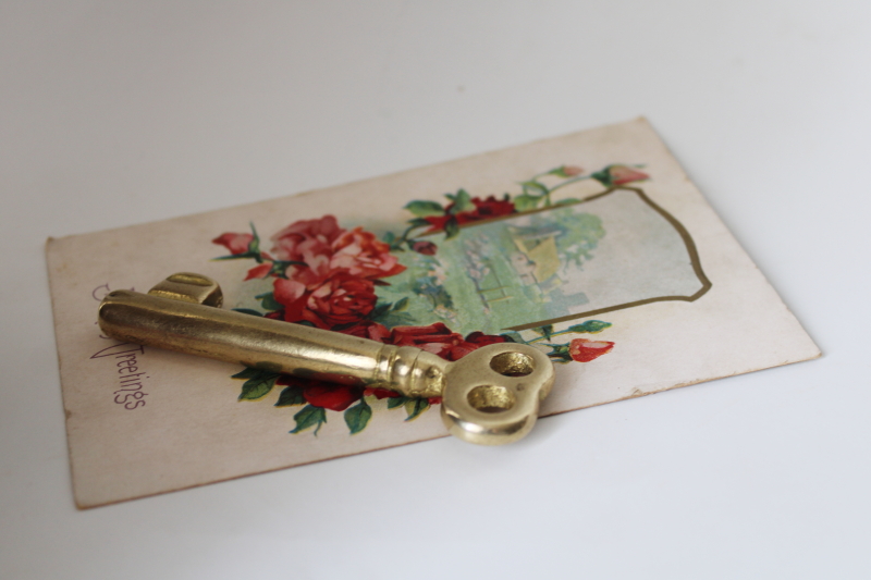 photo of heavy solid brass key paperweight, large skeleton key shape polished brass #2