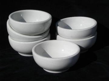 catalog photo of heavy white ironstone china footed bowls, vintage restaurant soup or chili bowl lot