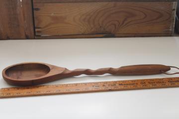 catalog photo of huge carved walnut wood spoon, handcrafted vintage pot stirrer or kitchen wall hanging art