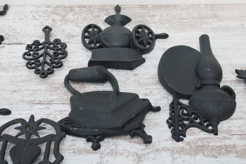 photo of huge collection vintage cast metal primitive wall art black iron trivets, country rustic decor plaques #10