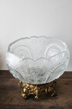 catalog photo of huge crystal clear pressed glass punch bowl w/ ornate metal stand, pinwheel pattern