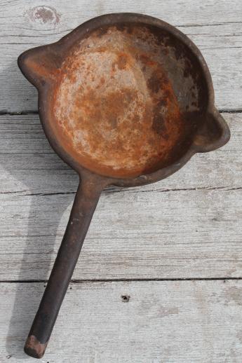 photo of huge heavy antique cast iron ladle, old blacksmithing tool or lead melting pot #1