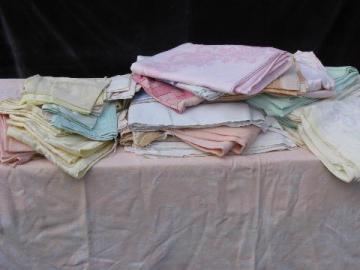 catalog photo of huge lot of vintage cotton and/or rayon damask table linens, 19 colored tablecloths+