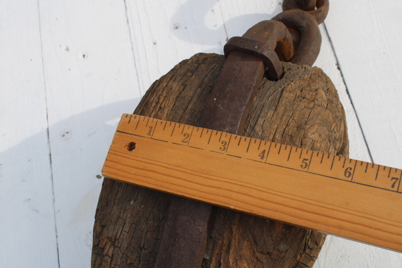 photo of huge old antique pulley, blacksmith hand forged iron w/ hook, worn weathered wood  #2
