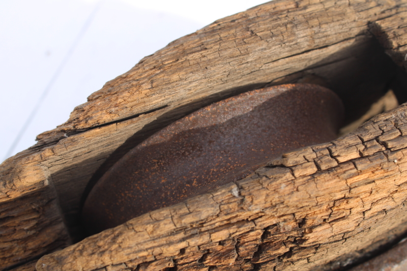photo of huge old antique pulley, blacksmith hand forged iron w/ hook, worn weathered wood  #4
