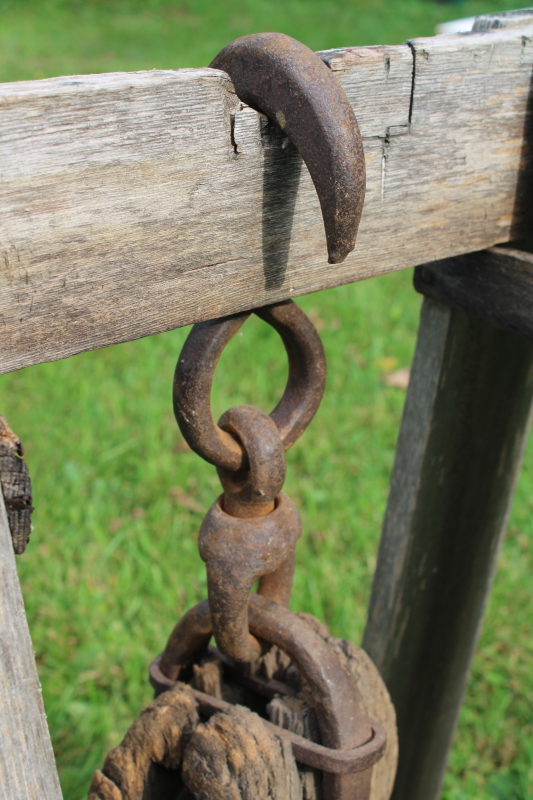 photo of huge old antique pulley, blacksmith hand forged iron w/ hook, worn weathered wood  #5