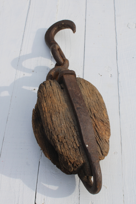 photo of huge old antique pulley, blacksmith hand forged iron w/ hook, worn weathered wood  #7
