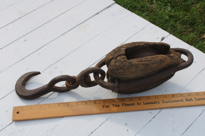 photo of huge old antique pulley, blacksmith hand forged iron w/ hook, worn weathered wood  #12
