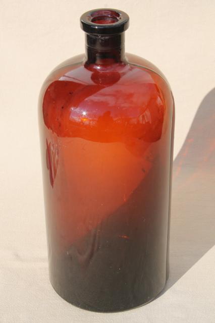 photo of huge old apothecary bottle, pharmacy chemical bottle in root beer brown amber glass #2