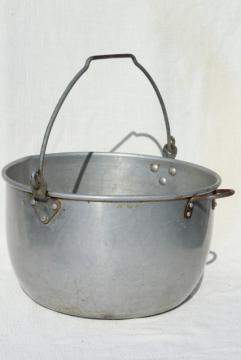 catalog photo of huge old cooking pot kettle cauldron w/ bail handle for hanging on camp fire / fireplace 