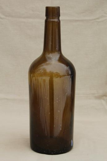 photo of huge old green glass bottle, vintage whisky bottle big one gallon size #2