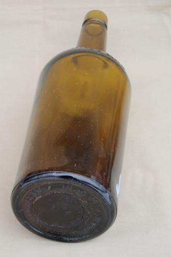 photo of huge old green glass bottle, vintage whisky bottle big one gallon size #3