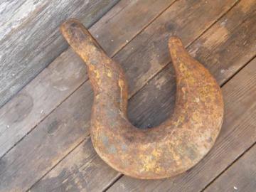 catalog photo of huge old iron ships chain, construction crane or industrial hoist hook