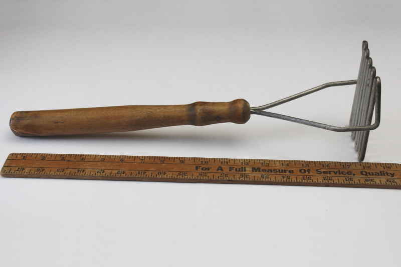 photo of huge old potato masher or crock tamper, primitive vintage kitchen tool w/ long wood handle  #1