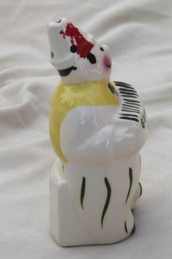 photo of kitschy vintage ceramic cheese shaker, accordion man w/ monkey dispenser for spaghetti cheese #2