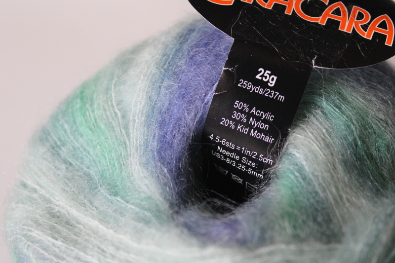 photo of lace weight mohair blend yarn, shaded green blue hand dyed look, Queensland CaraCara label #3