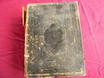 catalog photo of large antique bible, 1872 with embossed leather cover