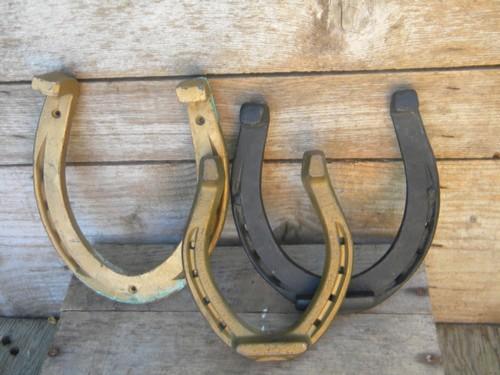 photo of large antique iron horseshoes w/Oshkosh, Wis forge mark/salesman's sample #1