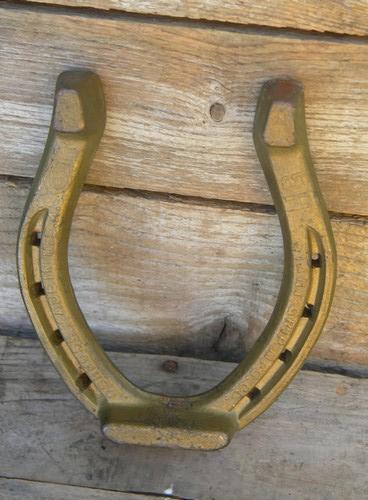 photo of large antique iron horseshoes w/Oshkosh, Wis forge mark/salesman's sample #3