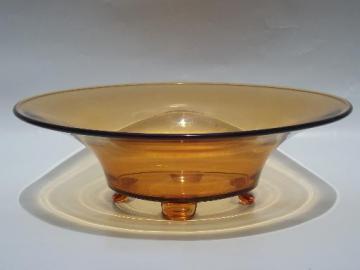 catalog photo of large centerpiece bowl vintage amber glass, paw footed flared rim shape