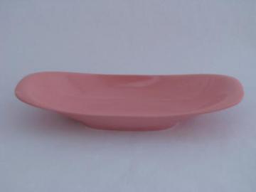 catalog photo of large long bowl, retro pink melmac