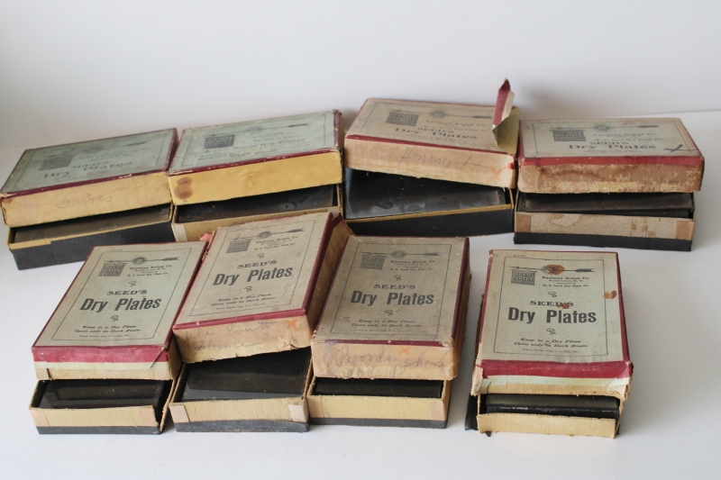 photo of large lot antique photographic supplies advertising boxes full of old glass plate photo negatives  #1