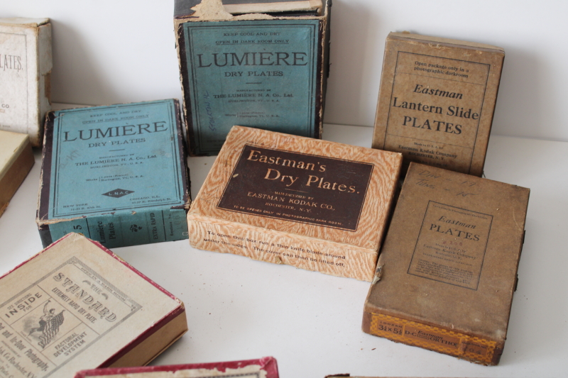 photo of large lot antique photographic supplies advertising boxes full of old glass plate photo negatives  #4