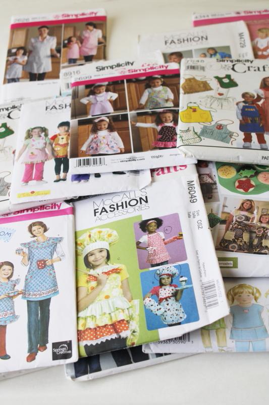 photo of large lot out of print sewing patterns, all aprons for children or mommy & me #1