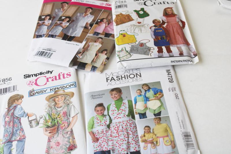 photo of large lot out of print sewing patterns, all aprons for children or mommy & me #3