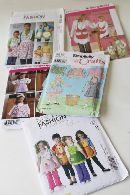 photo of large lot out of print sewing patterns, all aprons for children or mommy & me #4