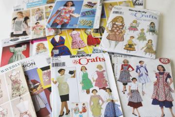 catalog photo of large lot out of print sewing patterns all kitchen aprons, full & half aprons