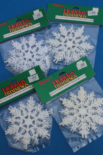 photo of large lot white Christmas glitter plastic snowflakes, retro ornaments sealed in pkgs #8