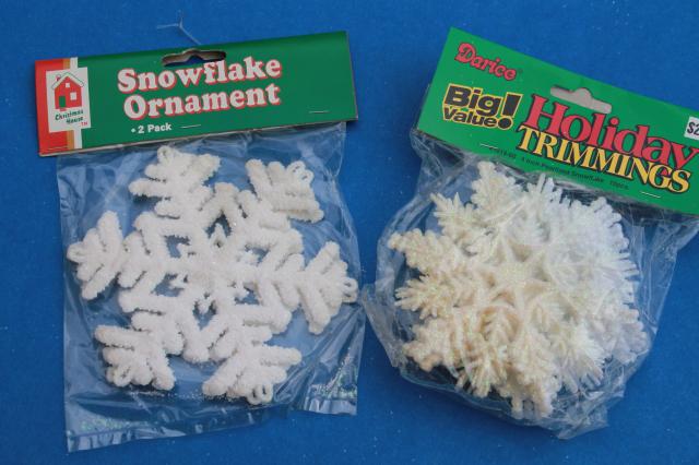 photo of large lot white Christmas glitter plastic snowflakes, retro ornaments sealed in pkgs #11