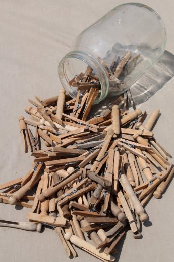 photo of large old gallon jar full of vintage clothespins, primitive wood clothespins lot #3