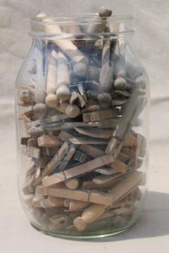 catalog photo of large old gallon jar full of vintage clothespins, primitive wood clothespins lot