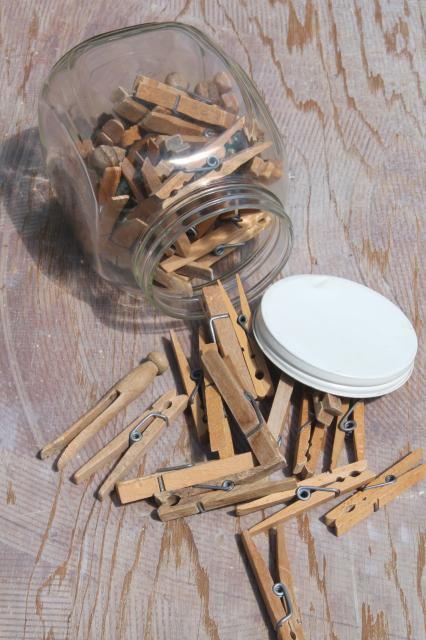 photo of large old glass jar full of vintage clothespins, primitive wood clothespins lot #2