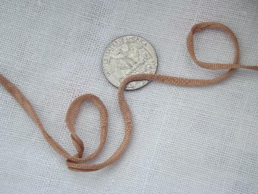 photo of large old rag balls made from silk stockings, shades of brown, buff, tan #2