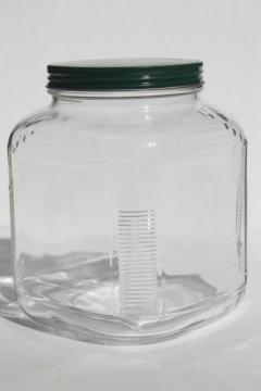 catalog photo of large old square glass jar w/ metal lid, store counter / hoosier style pantry canister