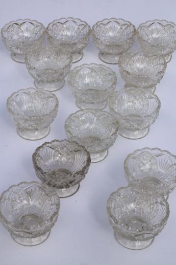 photo of large set antique pressed glass salt dips or dessert dishes in the Madora pattern #2