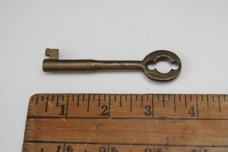 photo of large solid brass skeleton key, old key for vintage cabinet lock or door lock  #1