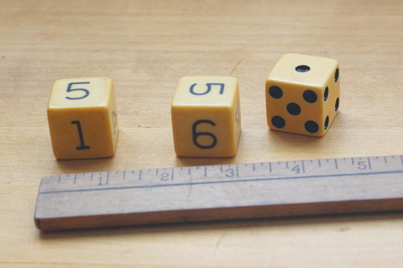 photo of large vintage bakelite dice, numbered dice & classic dotted die, butterscotch color #1