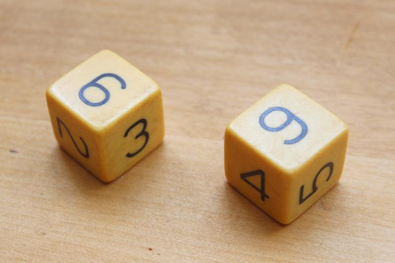 photo of large vintage bakelite dice, numbered dice & classic dotted die, butterscotch color #3