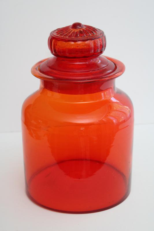 photo of large vintage glass canister or apothecary jar, tangerine orange glass bottle w/ lid #1