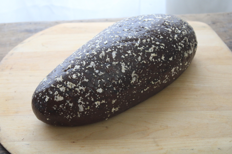 photo of life size pumpernickel loaf faux bread photo stylist prop, french country farmhouse style decor fake food #1