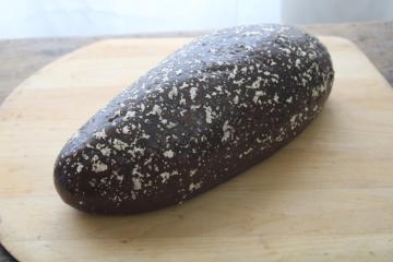 catalog photo of life size pumpernickel loaf faux bread photo stylist prop, french country farmhouse style decor fake food
