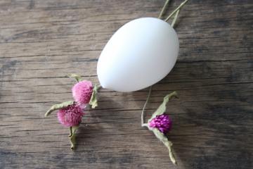 catalog photo of life size white milk glass Easter egg, antique vintage darning egg or nest egg